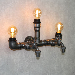 Wasserrohr Wandlampe